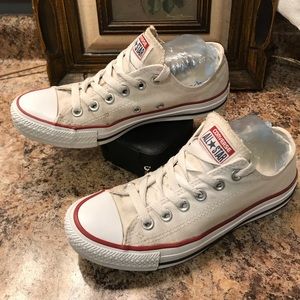 Converse Chuck Taylors Dark white woman’s size 7.